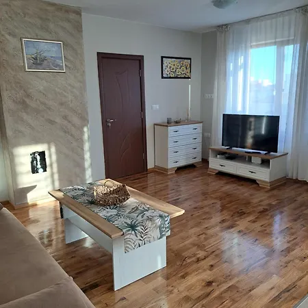 Megi Apartments, Sity